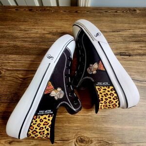 Skechers-SnoopOne Bombay Slin-ins Black/Animal Print. Sz Men's 11 & Women's 12.5